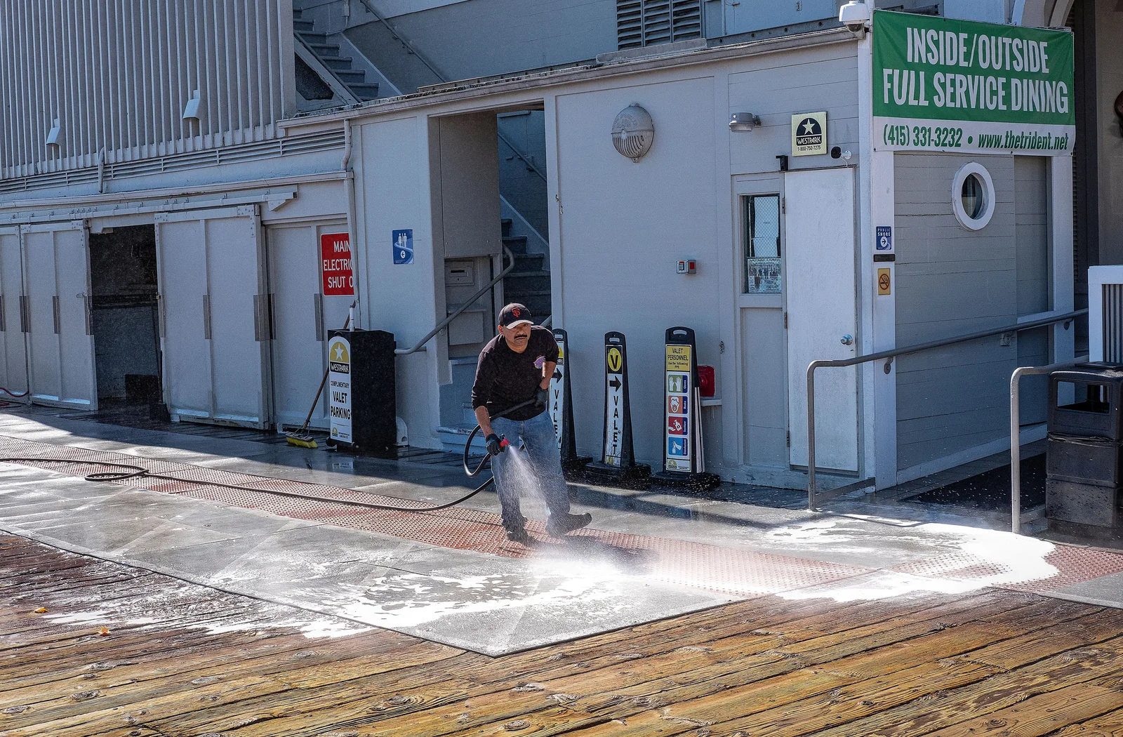 Professional exterior surface cleaning with a high-pressure water system