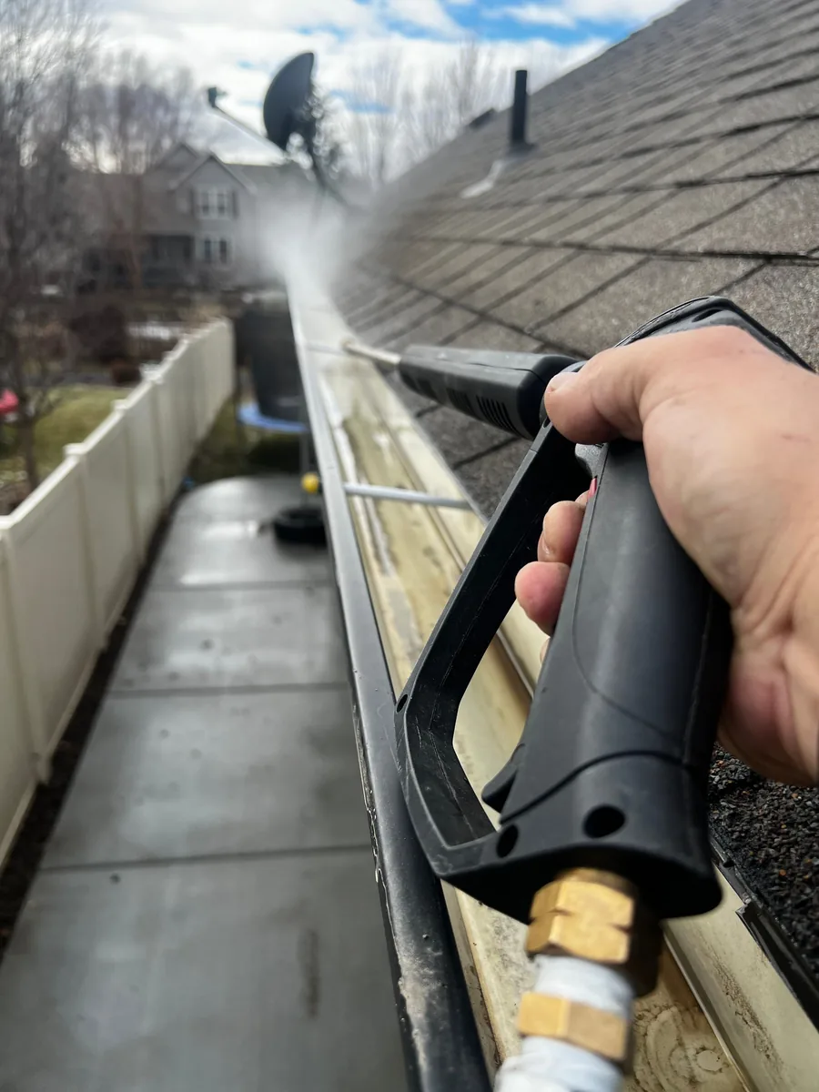 Pressure-washing equipment being used for exterior property care